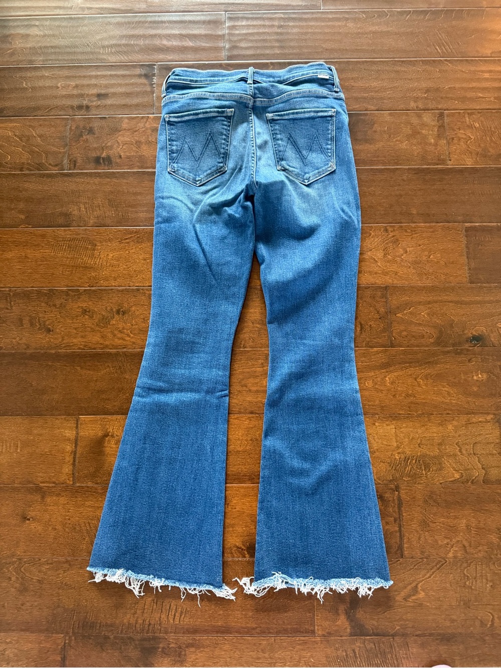 MOTHER Medium Blue Flare Jeans with Frayed Hem